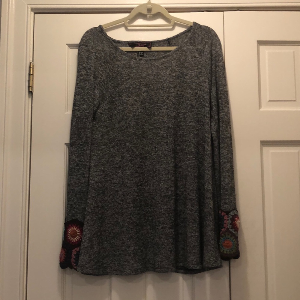 Fun, swing sweater with crocheted detailed sleeves